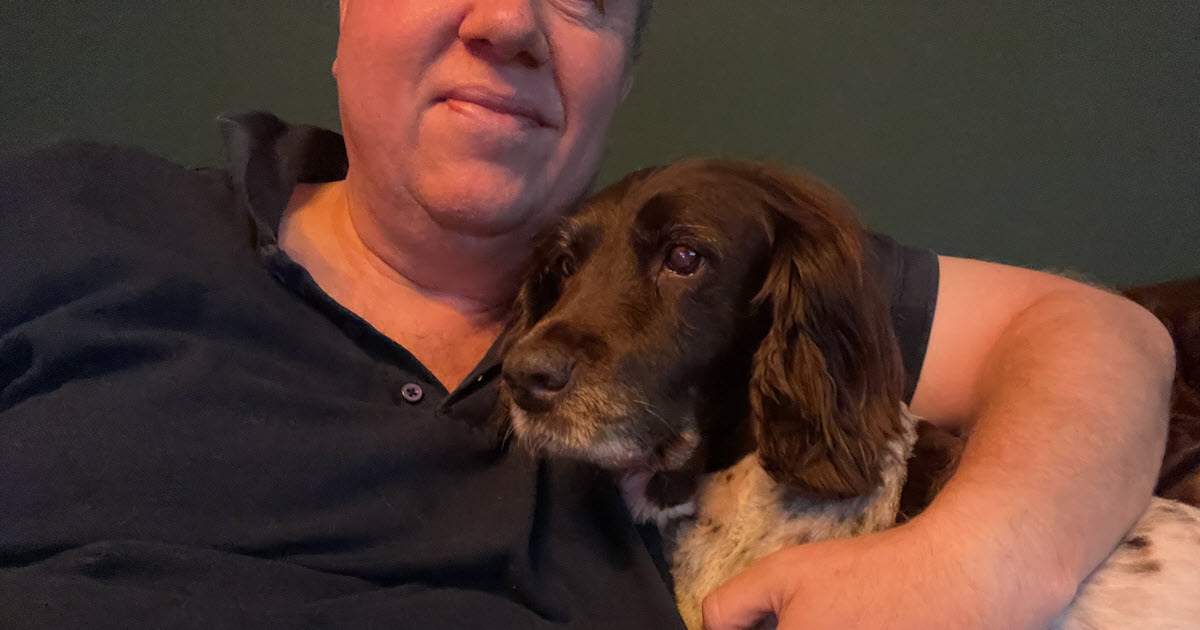 Cuddling Poppy on the couch